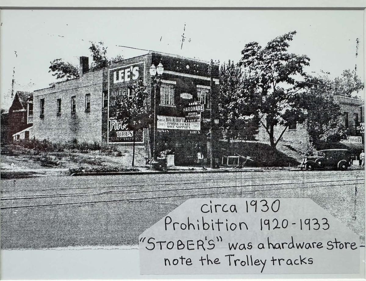 Stober's hardware store on E. Michigan Avenue, Lansing, circa 1930, with trolley tracks in the street
