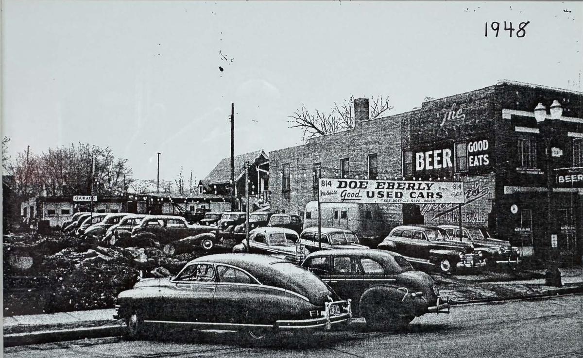 Doe Eberly Good Used Cars lot at 814 E. Michigan Avenue, Lansing, 1948